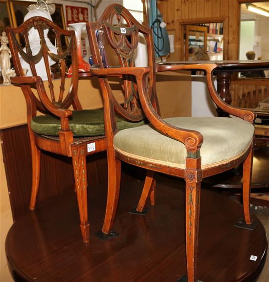 Two Hepplewhite style painted and decorated mahogany shield back elbow chairs